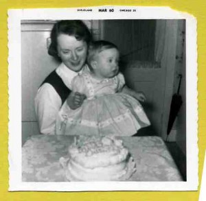 Celebrating my first birthday, February 28, 1960, with my mother, Anita