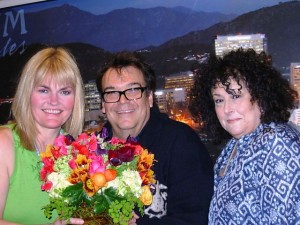 Cindy Dole with George and Evonne Woods - and their gorgeous arrangement of spring blooms