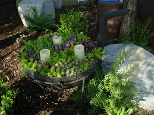 An elegant succulent tray-table with pedestal candles, by Nick Williams