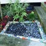 Barbara Balaban's tiny fountain with broken pottery mosaic trim