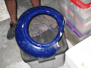The broken rim and top portion of an original Bauer urn