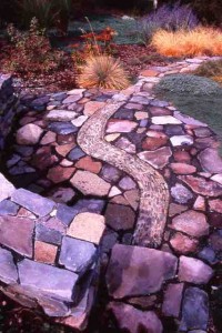 Hardscape, such as this fabulous pebble "river" running through a flagstone patio, can animate and energize the landscape. This was designed and installed by my Yakima friends Linda Knutson and Ron Sell (Debra Prinzing photograph)