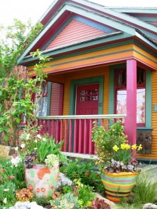 An exuberant color palette that few would dare to use - here's Keeyla's Berkeley bungalow and street-side "sunset" garden