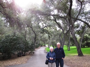 Anita (Mom) and Fred (Dad) at entrance to Oak-and-Camellia Forest