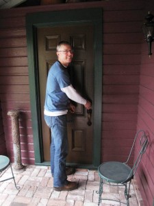 Jon Dove, showing off his old-new garden house