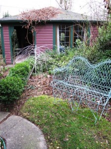 In a winter scene in a city garden, Jon's plum-and-green garden house is quite handsome