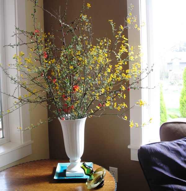 A vase filled with spring branches