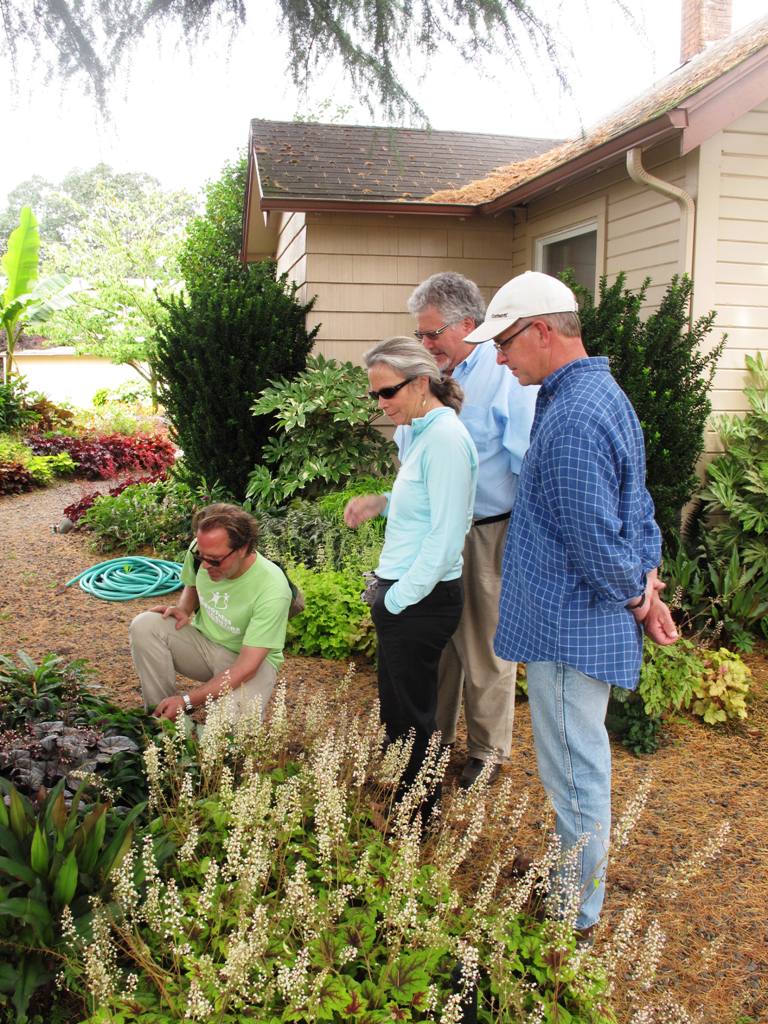 James, with Laurie & Mark, and Dan Heims, studying a perfect groundcover specimen.