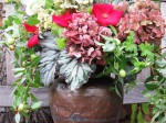 Detail: An autumn bouquet from a Tuscan garden. Olives, roses, hydrangeas, scented pelargonium leaves, Rex begonia leaves - seen here.