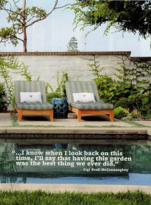 A pair of teak chaise lounges flank an Asian garden stool to accommodate sunbathers.