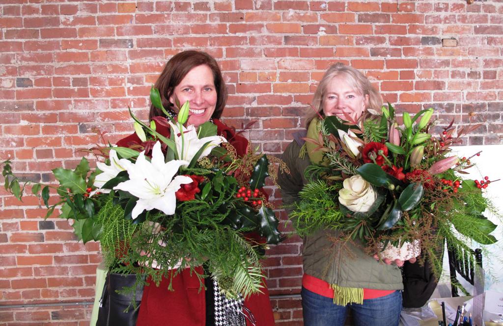 Friends Jill & Jane posed with their beautiful centerpieces.