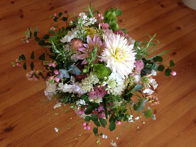 And here are bridal flowers in a softer scheme.