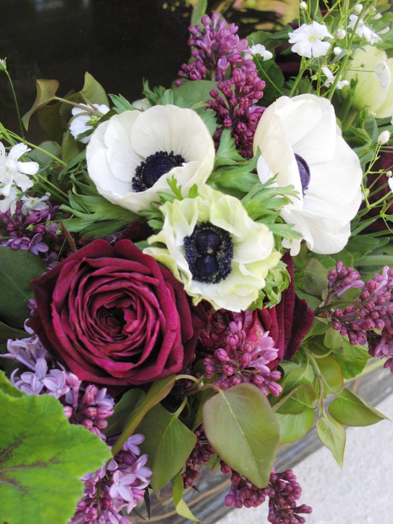 A yummy detail, featuring a dark purple rose that is so gorgeous it made me faint!