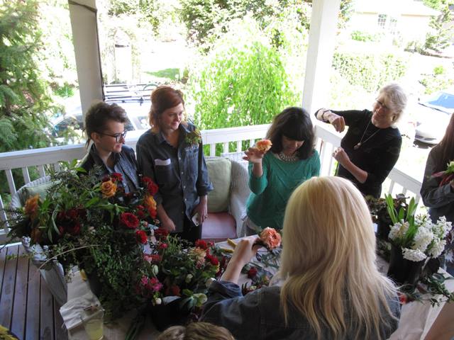 Just hours before the ceremony, Alicia Rico taught seven bridesmaids how to make floral crows to adorn their locks. 