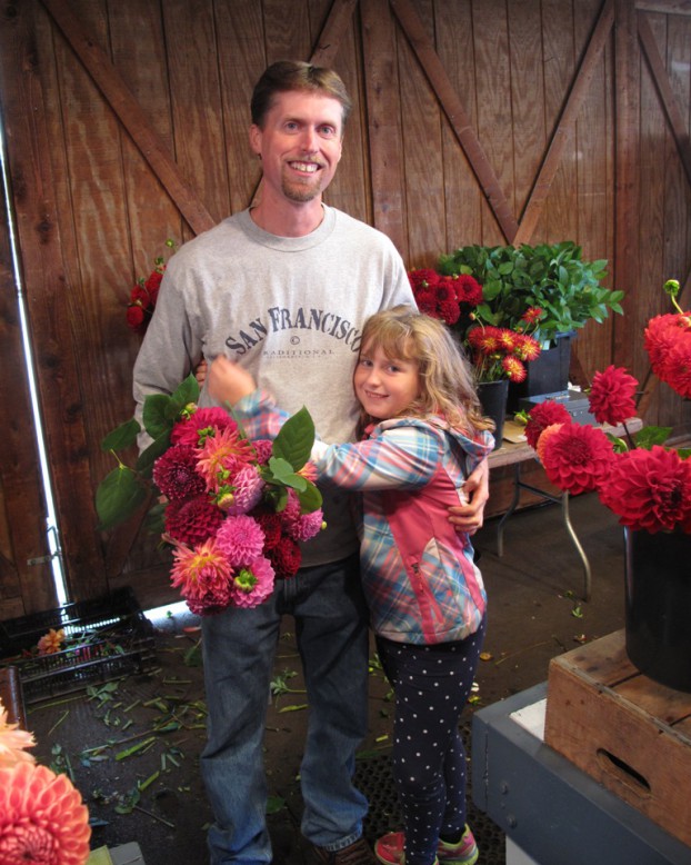 Dan Pearson of Dan's Dahlias, with his 8-yr-old daughter Alyssa.