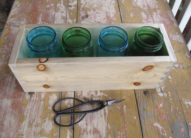 Here's how the jars nest inside the Blue Pine box. Notice the detailed dovetail joinery at the corners.