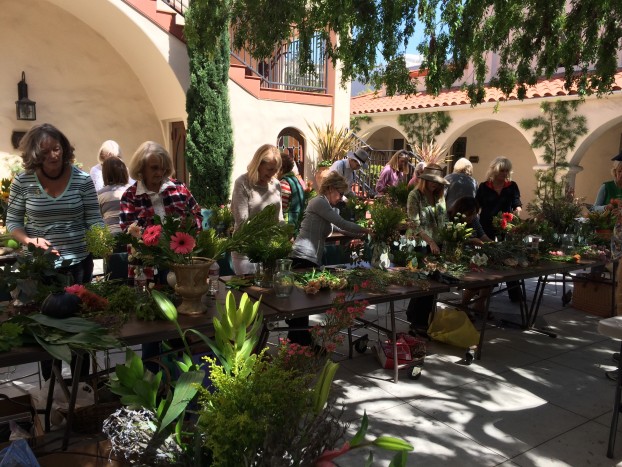 Twenty-five Slow Flowers designers, all members of the Laguna Beach Garden Club, at work on their personal projects.