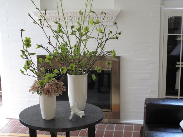 The vase at left is filled with Pieris and Dogwood; the vase at right has both flowering Dogwod and twig dogwood.