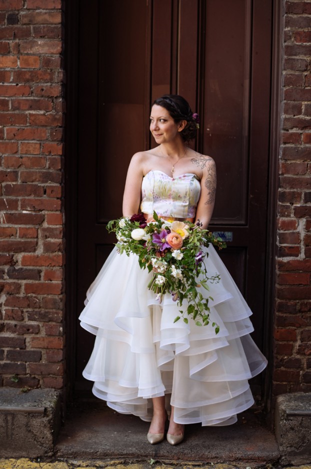 Eleanor on her wedding day with flowers by Kelly Sullivan of Botanique (Instagram photo from wedding photographer Shane Macomber)