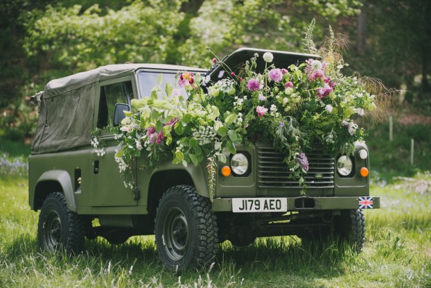 A classic Land Rover embellished in British-grown flowers in the countryside of Yorkshire!