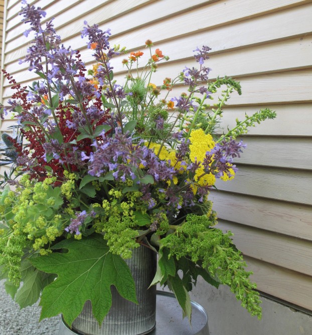 The lady's mantle and oak leaf hydrangea blooms add a touch of lime.