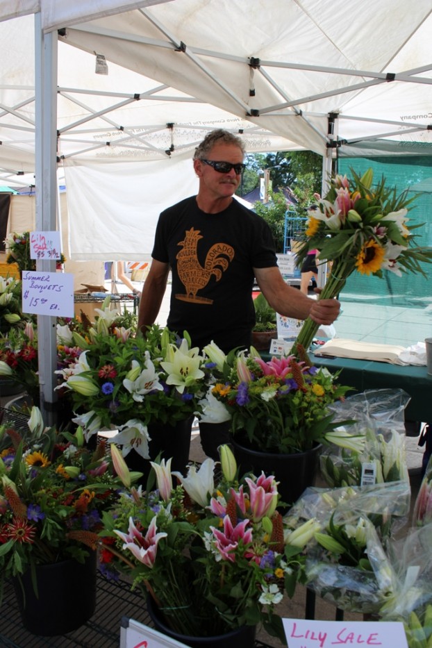 Chet Anderson of The Fresh Herb Co., sharing his beautiful and locally-grown bouquets and bunches at Boulder Co. Farmers' Market.