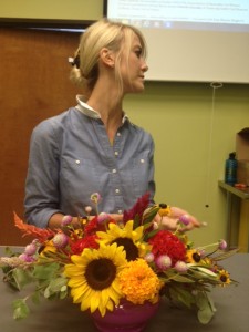 Morgan Anderson, The Flori.Culture, and Austin Community College design instructor demonstrates local Texas-grown flowers.