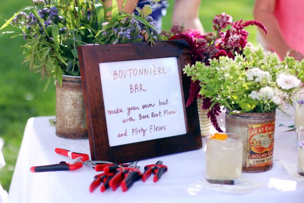 Robyn and Alicia came up with a "Boutonniere Table" for dinner guests to DIY their own wearable flowers.