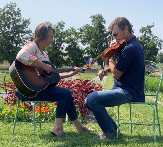 Scott and Anne Sumner of Walla Walla Flower Farm performing in their fields