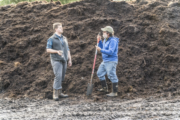 Biodynamics team, Director of Viticulture Ray Nuclo (right) and Viticulturist Edward Burke (left) in front of the compost pile. 