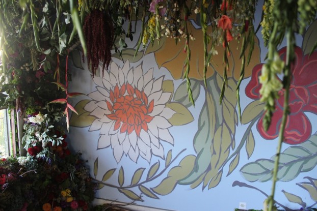 Love these giant flowers on the walls of "Wild, Floral Graffiti," that complement the all-American flowers.