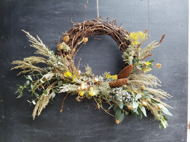 Use a grapevine wreath base to simplify DIY decor. Beth Syphers of Crowley House Flower Farm in Rickreall, OR, taught her student Kaylean Martin how to create a lush harvest wreath with foraged greens and more. 