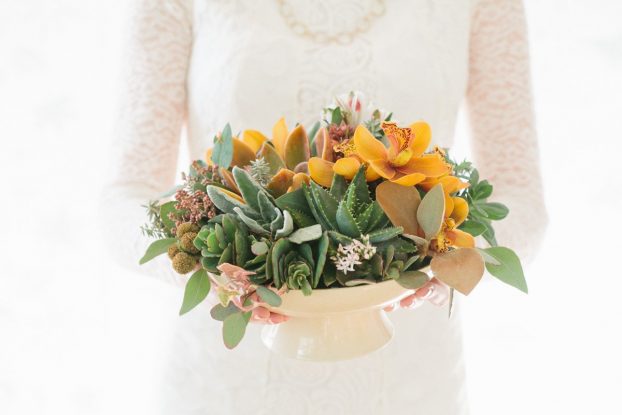 Burnished orchids and succulents communicate a modern autumn vibe. Margaret Lloyd of Margaret Joan Florals in Santa Barbara, CA, interprets the season with a decidedly contemporary point of view. 