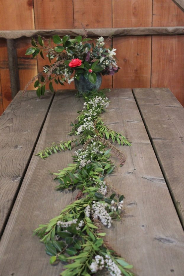 Foraged foliage from Open Field Farm, designed as a garland by Heather Frye of Venn Floral Design