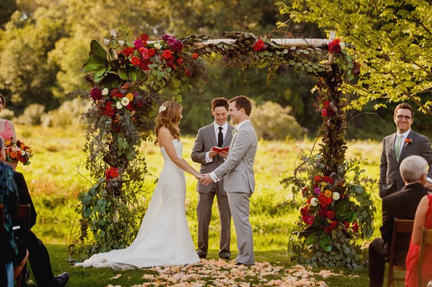 Almost everything on this arbor is Michigan grown or foraged - even the actual birch arbor, which came from a Northern Michigan tree farm that provides birch, dogwood and evergreens to wholesalers. This wedding was held on one of the state's beautiful farm venues called Misty Farms in Ann Arbor, Michigan. Photo credit: Jess & Nate Studios