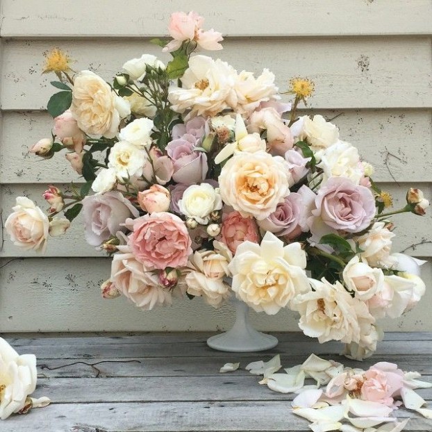 This arrangement was made completely of American grown boutique roses from Rose Story Farms in California. "I love the imperfections of these vintage style roses," Liz says.
