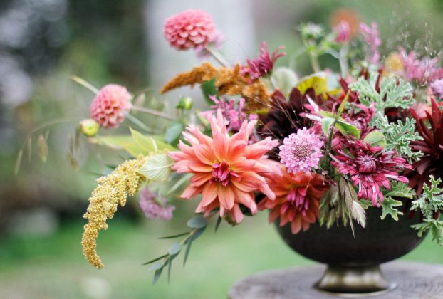 Combine warm and cool floral colors for a surprising palette. Tobey Nelson of Vases Wild in Langley, WA, designs with a fresh mix of ingredients not typically associated with autumn. 