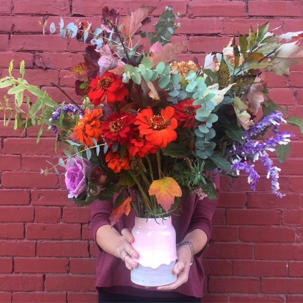 One of the larger bouquets designed by Dan for local delivery. The vase is locally made by potter Brian Giniewski, whose work Dan promotes and sells.
