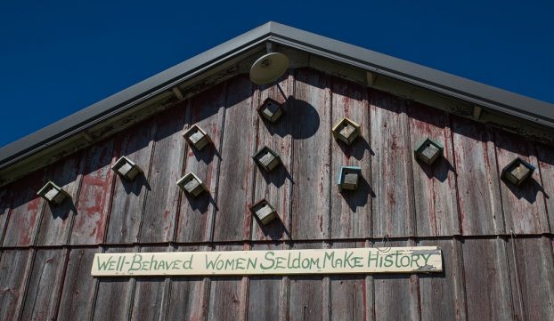 Gotta love a motto like this one, spotted high on a barn in the cutting garden.