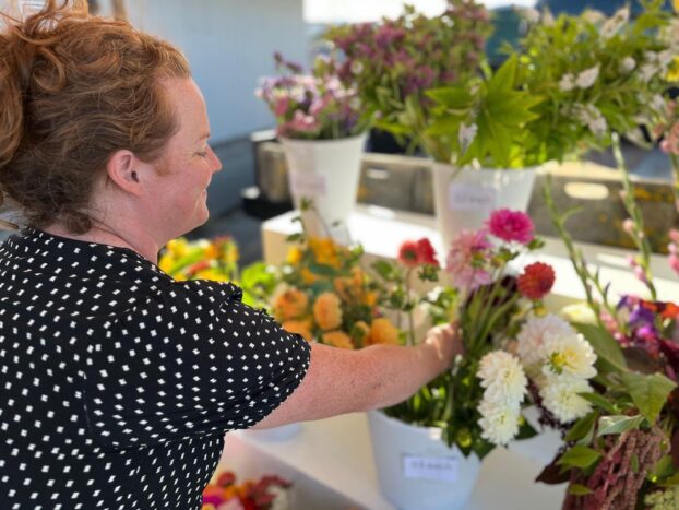 Jodi at a flower popup sale