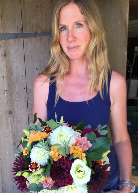 Melissa with a bouquet of Massachusetts-grown (and designed blooms)